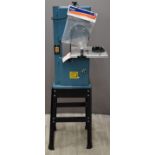 Clarke bandsaw on stand with extra Draper blade