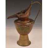 Tibetan / Nepalese copper and brass jug or ewer with relief mythical bird decoration, H30cm,