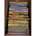 Forty-two Warner Bros, Hanna-Barbera and Terrytoons annuals including Bugs Bunny, Yogi Bear and