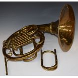 A travelling French horn, the main brass body and slides disconnecting from the bell to fit into a