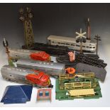 A collection of Lionel 0 gauge model railway items including steam locomotive, Santa Fe diesel