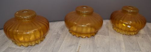 Set of three amber glass light shades, H25, diameter 36cm