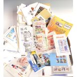 Gibraltar and Canada stamps and covers, singles and blocks and a Canada specialist catalogue,