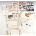 A quantity of UK stamp covers and pre-decimal stamp booklets and 1960s first day covers, some