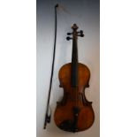 Late 19th / early 20thC violin labelled Antonius Stradivarius, with 36cm two piece back and bow,