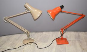 Two retro Herbert Terry Anglepoise lamps, one in red the other fawn coloured