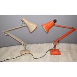 Two retro Herbert Terry Anglepoise lamps, one in red the other fawn coloured