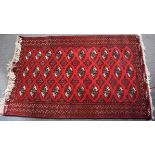 Red ground rug, 210 x 129cm
