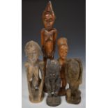 Five various African tribal figures, height of tallest 72cm