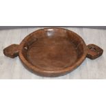 Two-handled carved country style wooden bowl, W71cm