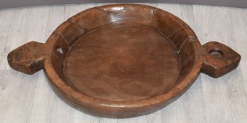 Two-handled carved country style wooden bowl, W71cm
