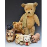 Six vintage Teddy bears including a blonde mohair example with clockwork musical box playing