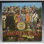 The Beatles - Sgt Pepper's Lonely Hearts Club Band (PCS 7027) (YEX 637-1) record and cover appear