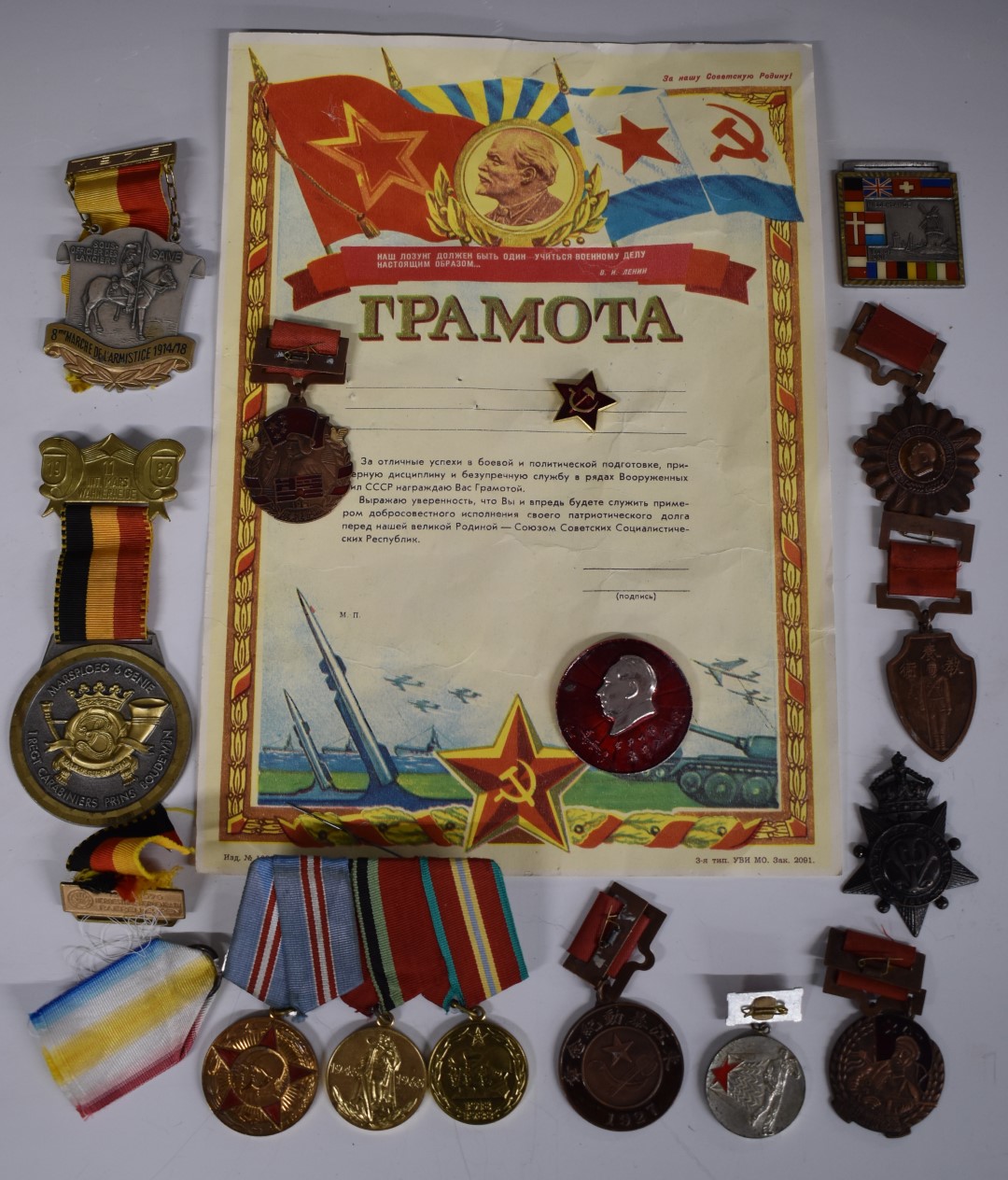 Small collection of commemorative medals including Russia, China and Belgium