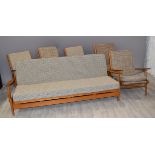 Scandart of High Wycombe mid century modern chairs and sofa comprising four armchairs, one rocking