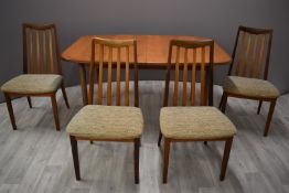 G Plan retro mid century modern extendable table and four chairs, W143 x D99 x H73cm