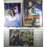 Three framed film posters for Star Wars Empire Strikes Back, Forbidden Planet and The Day The