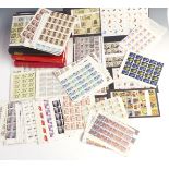 Three albums of mint QEII stamps, mainly 1970s-1990s, comprising quarter sheets and larger blocks,