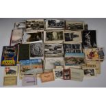 Approximately 500 world topographical postcards, souvenirs and booklets including Italy, France,