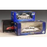 Three 1:18 scale diecast model cars Minichamps Audi TT 2006 and Revell Audi TT Coupe and Auto