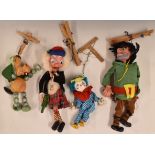 Four Pelham puppets comprising Macboozle, Giant, Baby Dragon and Clown. Some boxed or partially