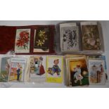 Album of over 250 postcards both loose and in album, mainly humour and greeting cards including
