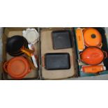 A collection of mainly Le Creuset cast iron cooking ware and some similar Waterford items