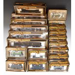 Twenty Mainline 00 gauge model railway wagons and vans, all in original boxes.