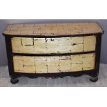 A bow fronted chest of two drawers with distressed decoration, W118 x D50 x H69cm