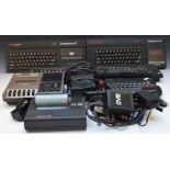 Five ZX Spectrum computer consoles including 48k, +2 and +3 models. Together with a collection of