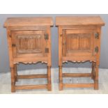 Pair of oak linen fold pot cupboards, W53 x D35 x H83cm