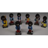 Eight Robertson's Golly "Jazz Band" figures