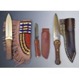 Thee modern knives including a beaver tail dagger with leather sheath, blade length 18cm, a