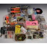 Soft plastic fishing lures, many unused in unopened original packaging, suitable for game, coarse or