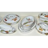 Approximately twenty nine pieces of Royal Worcester dinner ware decorated in the Evesham Gold