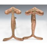 Pair of copper Art Nouveau or Arts and Crafts fire dogs, height 31cm