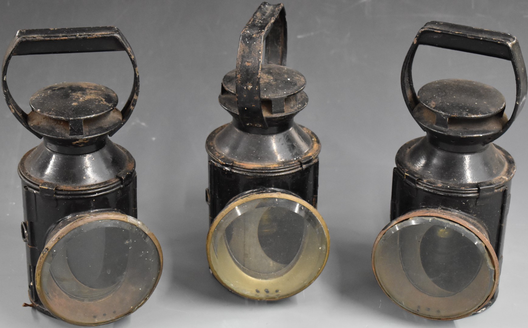 Three British Railways tri colour railway hand lamps, each stamped BR, height 28.5cm