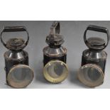 Three British Railways tri colour railway hand lamps, each stamped BR, height 28.5cm