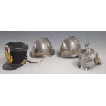 Four miniature military helmets, comprising French shako for 59th Regiment, Prussian pickelhaube and