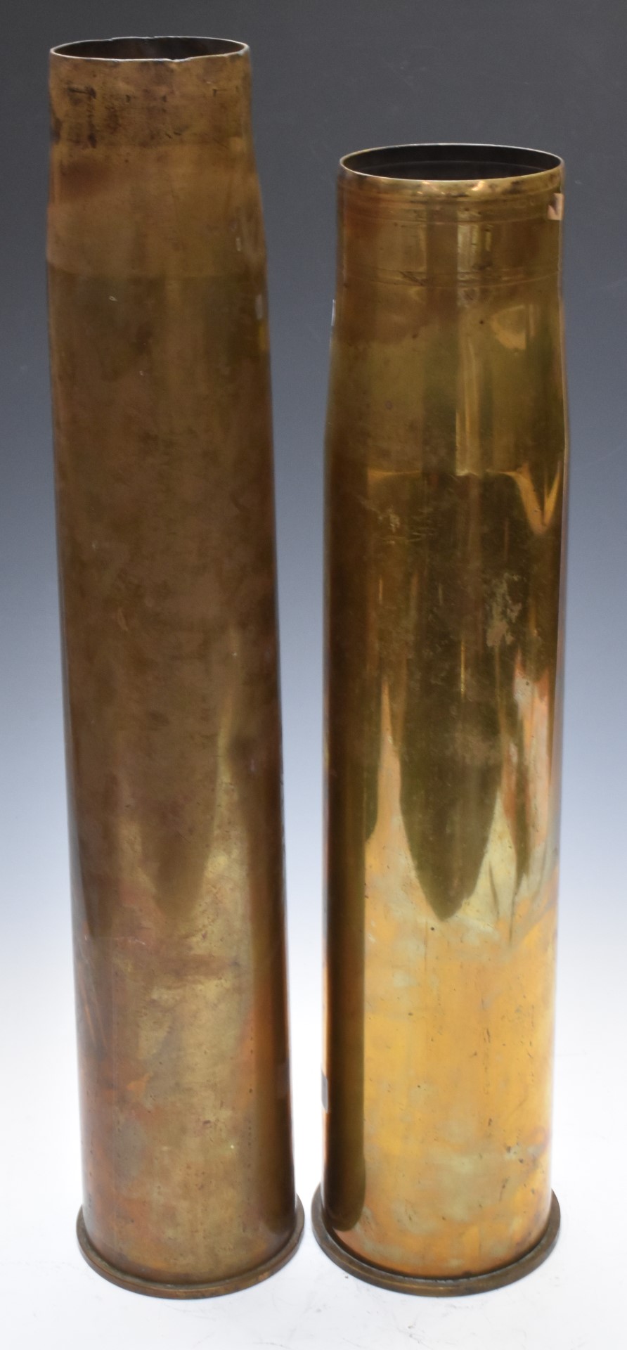 WW2 British 3.7inch gun artillery brass case dated 1942, together with another brass case, tallest