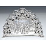 Late 19thC continental silver letter rack, each side with repoussé decoration depicting Rembrandt'