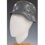 WW2 German Luftwaffe single decal steel helmet, with eagle stamp and initials FL and D7 to leather