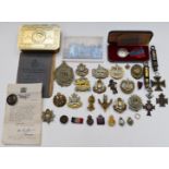 Small collection of badges and militaria including Gloucestershire Regiment, R.E.M.E, Argyll &