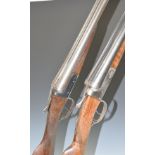 Two 12 bore side by side shotguns one Spanish Sarasqueta serial number 8664 the other unnamed serial