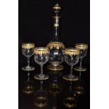 Baccarat c1890 wine decanter and four matching glasses with gilt and turquoise jewel decoration,