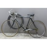 Raleigh touring or racing bicycle with Reynolds 531 frame and Shimano derailleurs and levers,