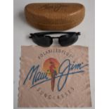 A pair of Maui Jim designer sunglasses in case