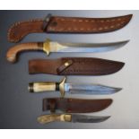 Three modern Damascus bladed knives all with leather sheaths, largest blade 31cm. PLEASE NOTE ALL