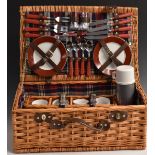 Wicker picnic hamper with contents including china plates and mugs, Thermos, cruet and cutlery