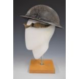 WW2 British 'Brodie' steel helmet stamped RFM 1939 to rim with R to front complete with liner and